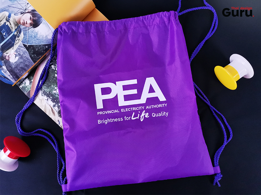 รับทำ ถุงผ้าร่มหูรูดสะพายหลัง PEA สีม่วง งานอีเว้นท์ บริษัท องค์กร